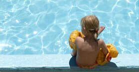 Child Sitting Poolside