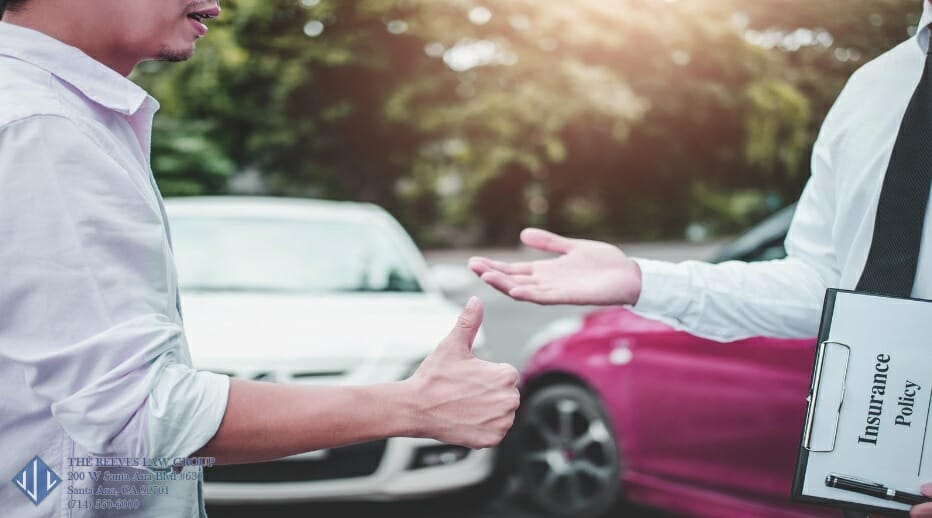 car insurance agent talking to a car owner