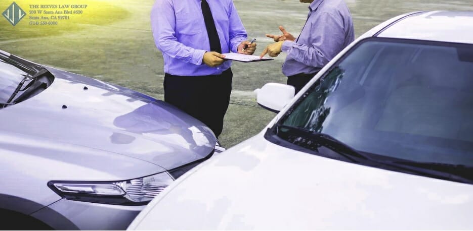 two person showing statistics each other near white car