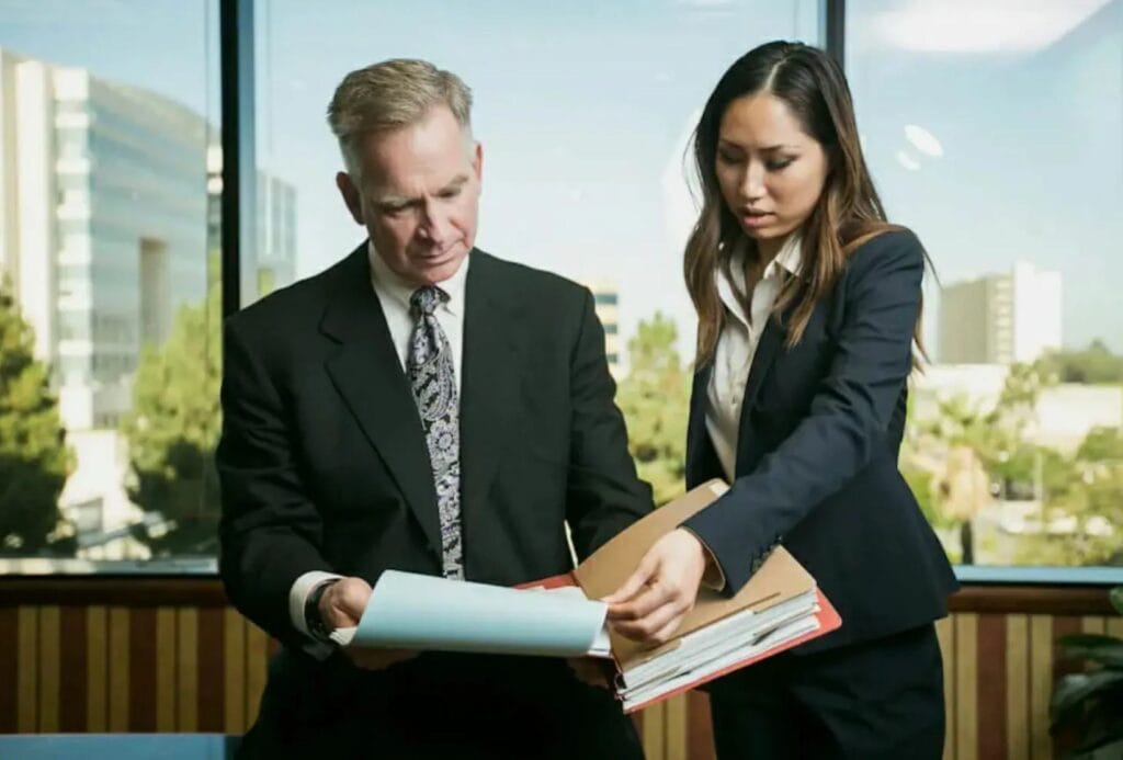 derek pakiz and paralegal working on a boat accident case