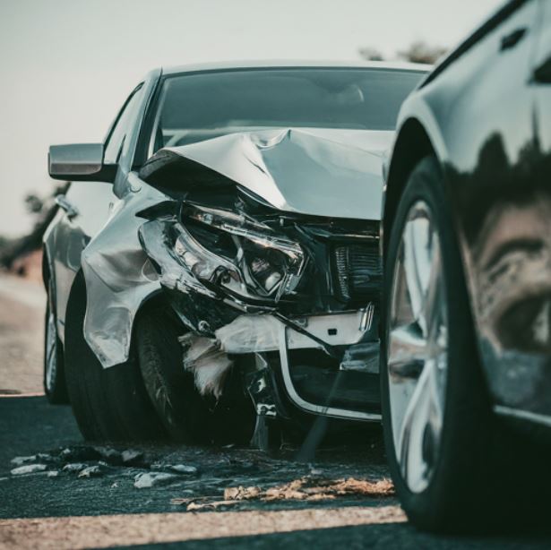 car accident silver car wrecked front end